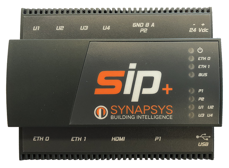 A Synapssys SIP+ DAIKIN Building Intelligence electrical module in black plastic, featuring orange and white branding, terminal labels, and LED status indicators.